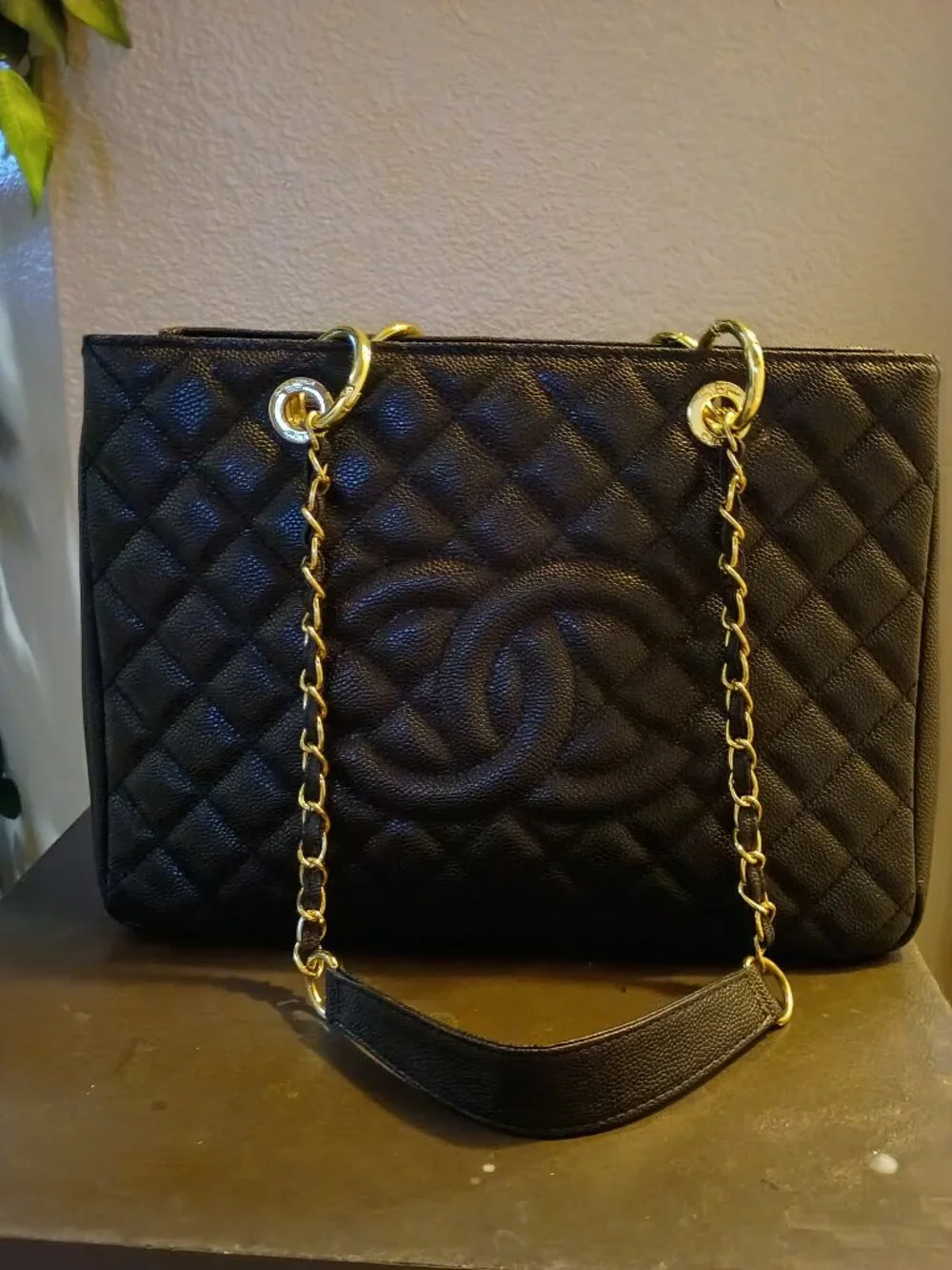 Authentic CHANEL discontinued gst black caviar leather with gold hardware